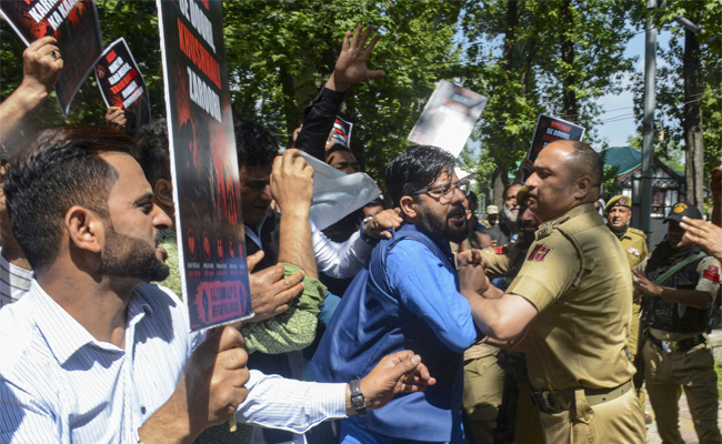BJP holds protest demanding liquor ban in J-K, police detain leaders briefly